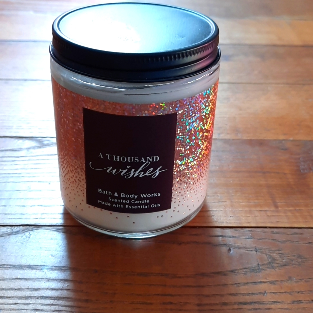 A thousand wishes candles smell just like the perfume so beautiful.